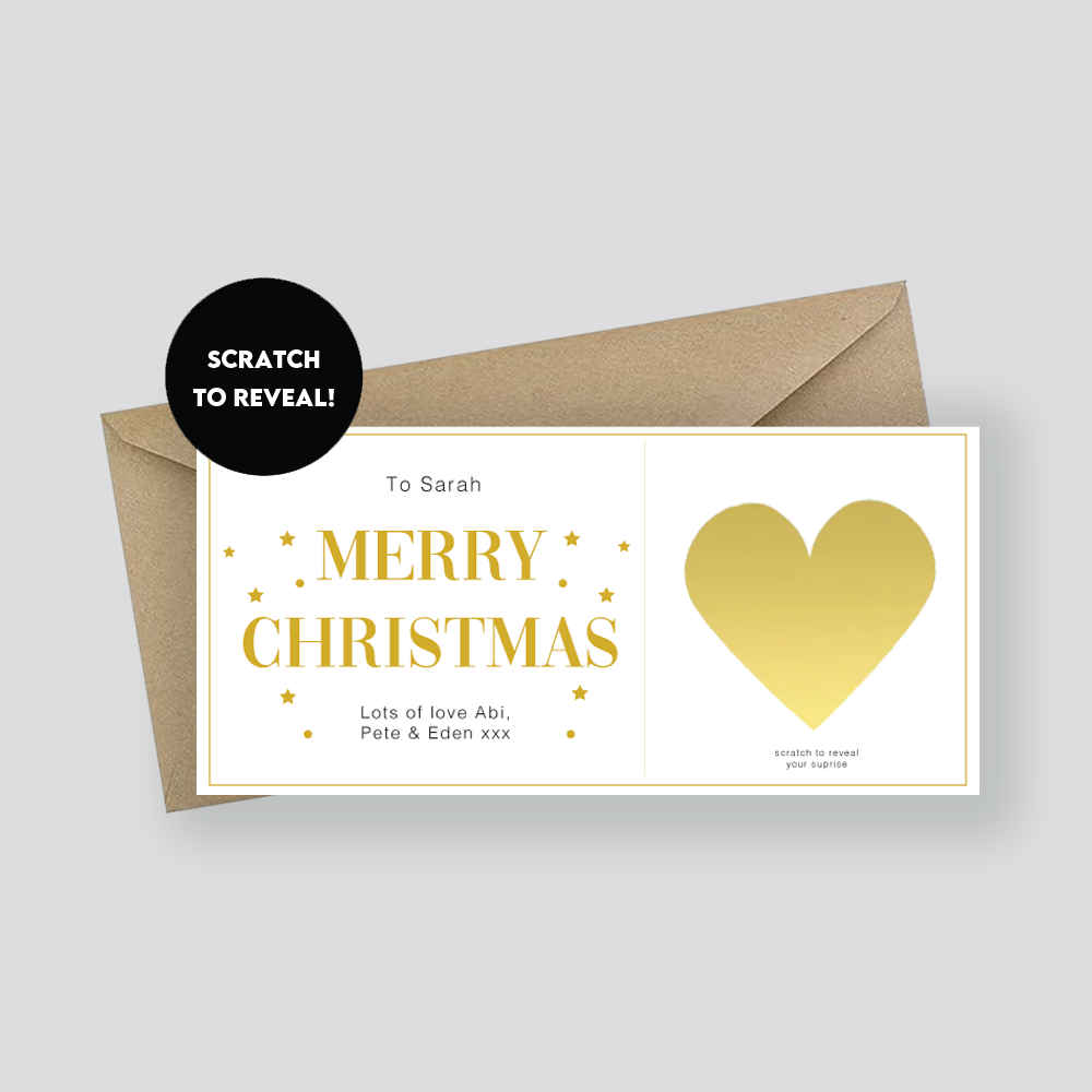 Christmas card with gold heart and envelope on a light gray background